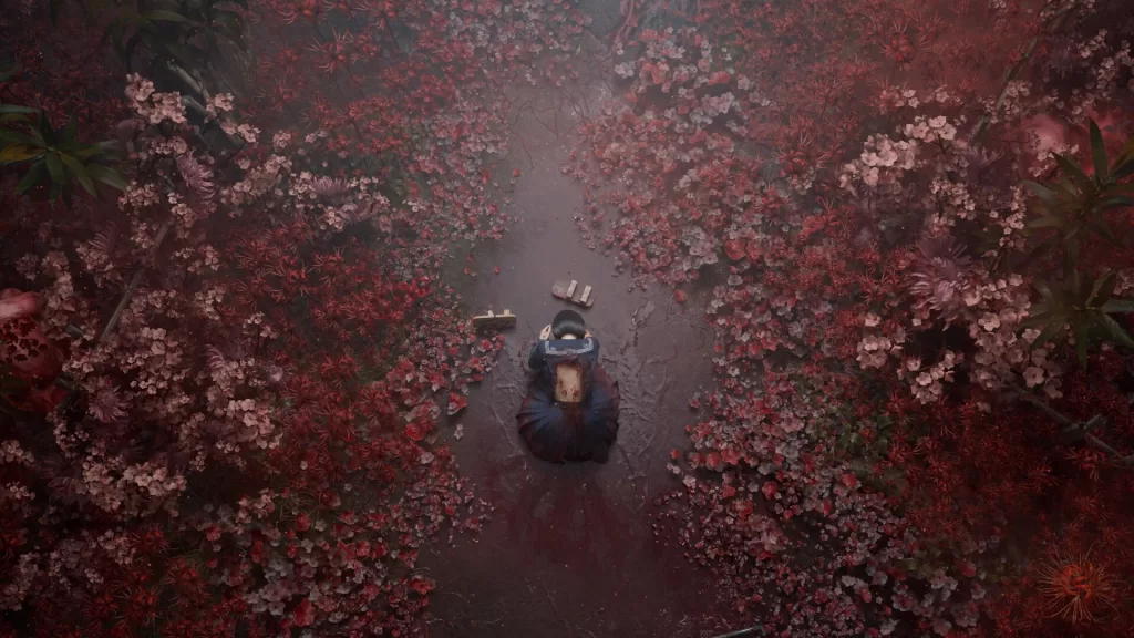 Silent Hill f protagonist Hinako collapses to the ground in a small clearing amid a field of red flowers that unsettlingly resemble internal organs. The back of her school uniform shirt is torn away to expose bloodied scratches up her back.